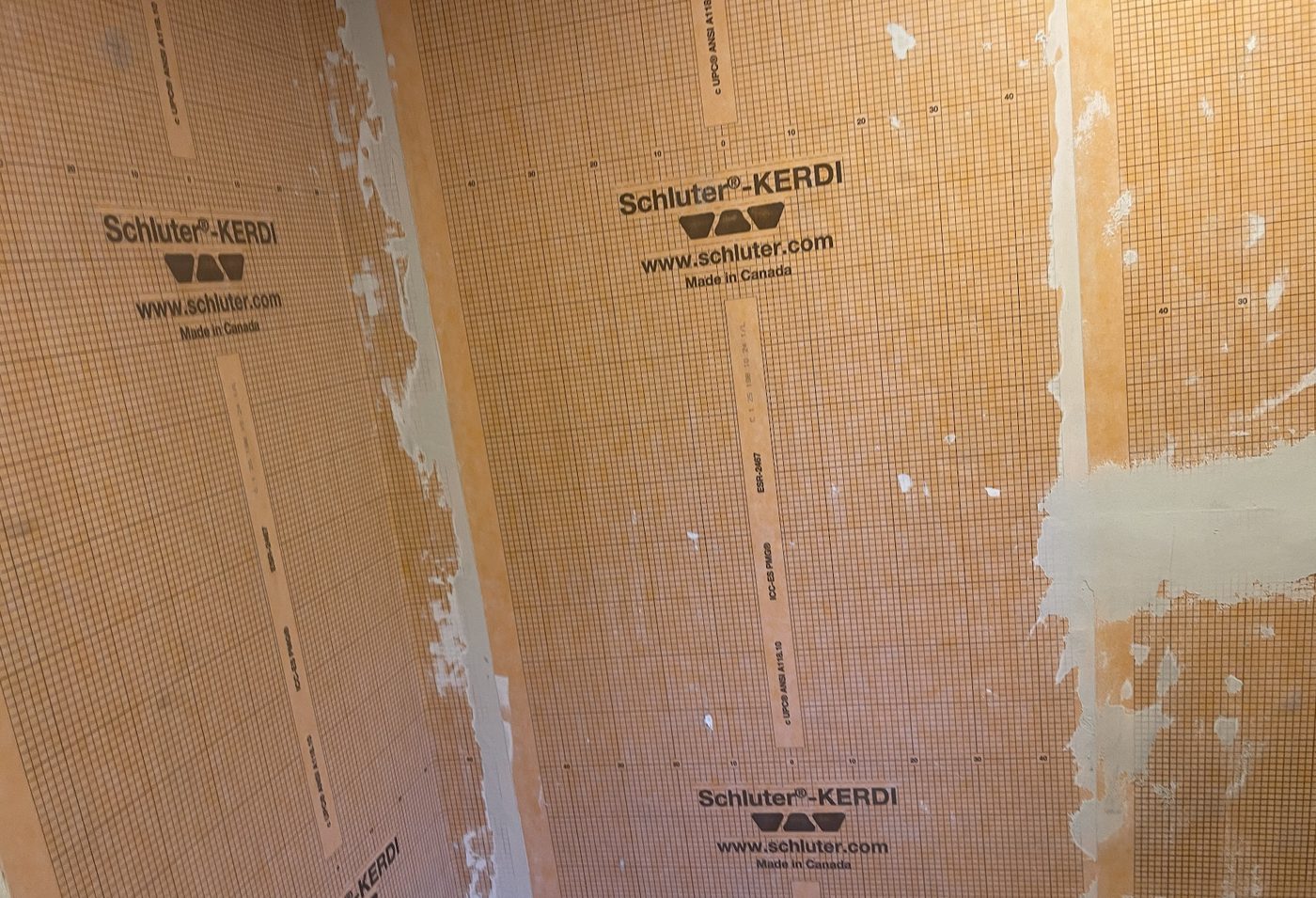 Schluter-KERDI shower waterproofing during bathroom renovation in North Vancouver by Luxevita Construction